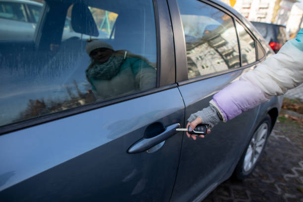 istock A guide to unlocking a car door using a key fob, highlighting modern convenience and mobility 2200883437