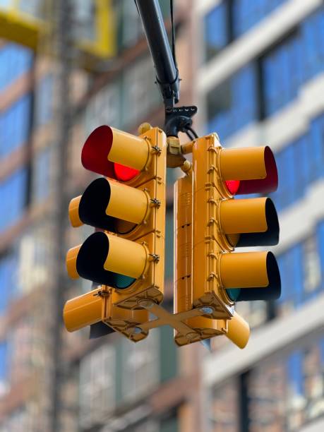 istock Yellow traffic light in the city center 2200886441