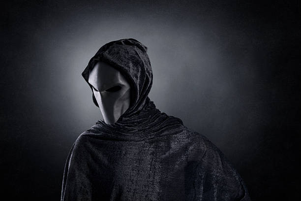 istock Mysterious humanoid alien at night over dark misty background 2200896338