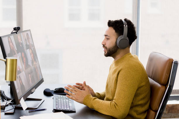 istock Man in Video Conference, Casual Office Setting 2200897729