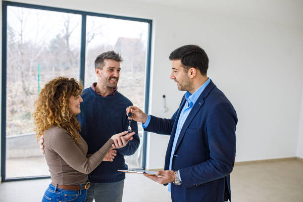 istock Happy couple buys a house 2200903060