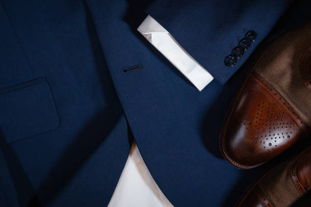 istock A man's suit jacket and shoes are displayed on a table 2200905594