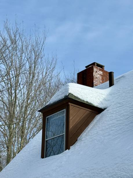 istock Snow on Home Roof and Dormer 2200913407