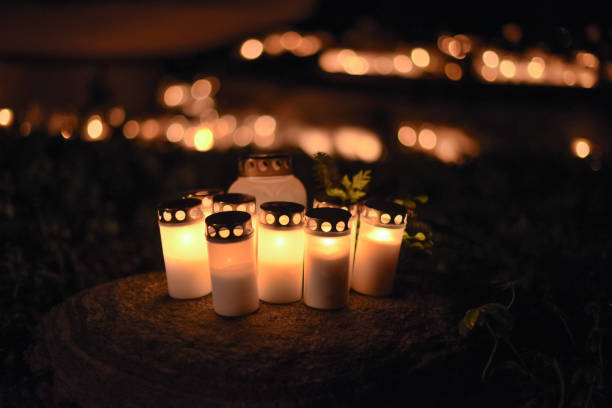 istock Grave lights at a graveyard at all hallows eve. 2200915553