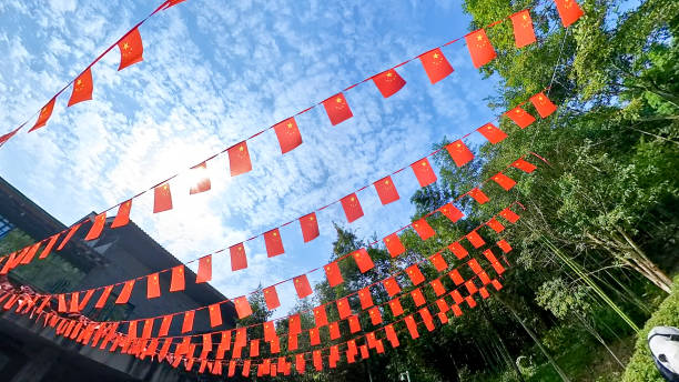 istock rows of mini China national flags flying in the sky 2200917096