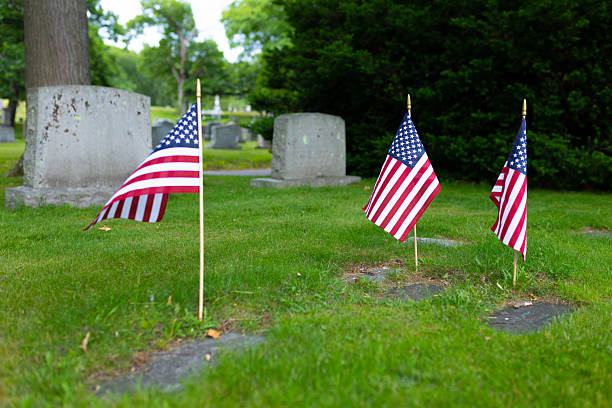 Historic cemetery for confederate soldiers in Philadelphia city. Confederate flags are placed on memorial event for the fallen. Can be used for American civil war / American history storytelling.