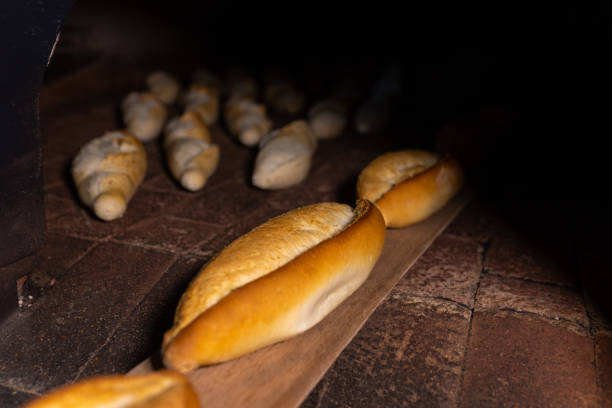 Turkish breads at the exit from the oven after cooking stock photo