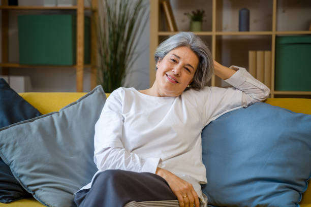istock senior woman relaxing at home 2200922940