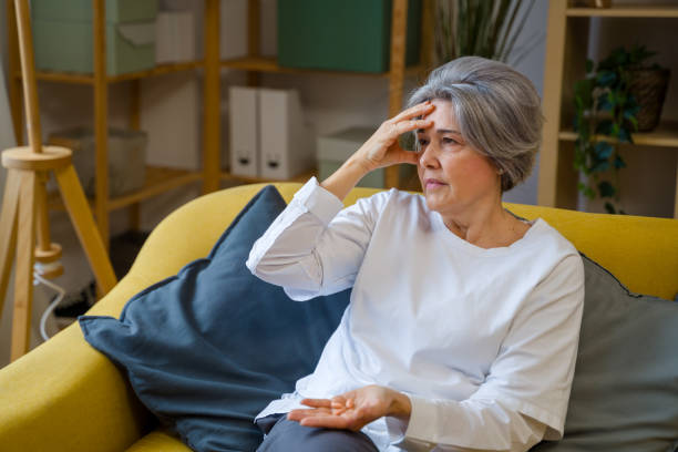 istock Senior woman suffering from headache 2200923968