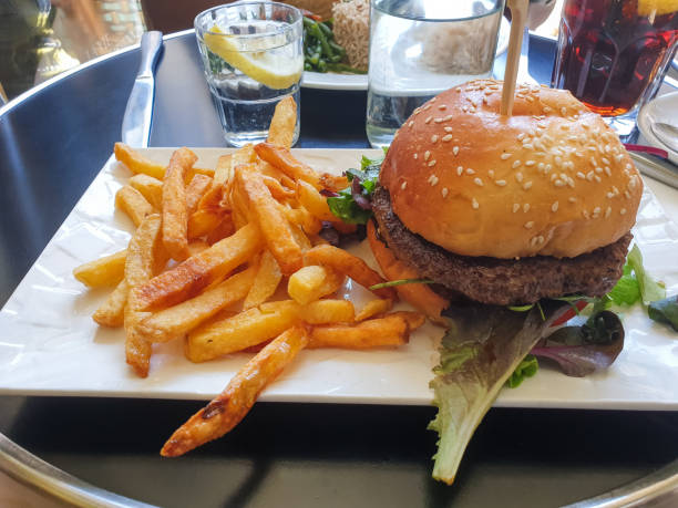 Burger and Chips at a restaurant in Paris, France.