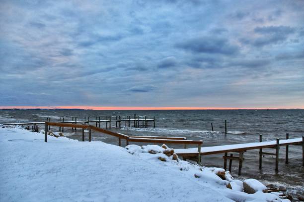 istock Snowfall and fishing piers, Chesapeake Bay 2200937305