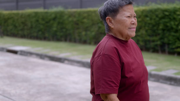 istock Asian senior woman walking exercise. 2200938496