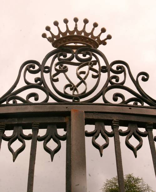 Heraldic shield on wrought iron railing with noble crown – Historical architecture in Bergara