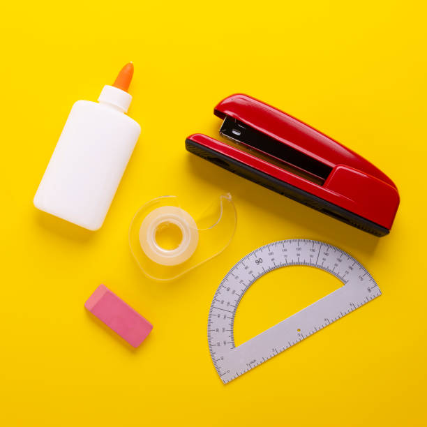 Colorful School Supplies on a Yellow Background