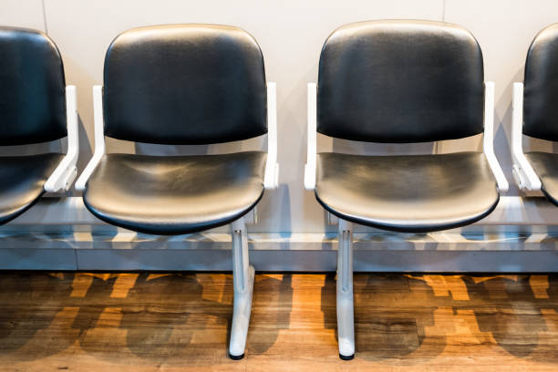 istock A row of chairs in a waiting room. 2200960426