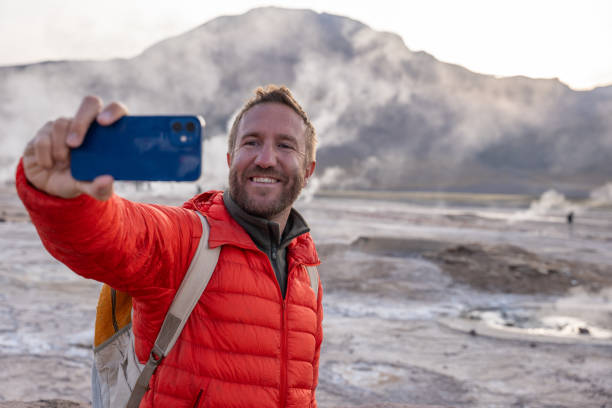 istock Man Taking Selfie in Scenic Geothermal Landscape 2200965383