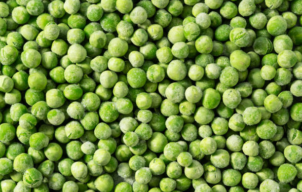 istock Full-Frame View of Frozen Green Peas from Above 2200966287
