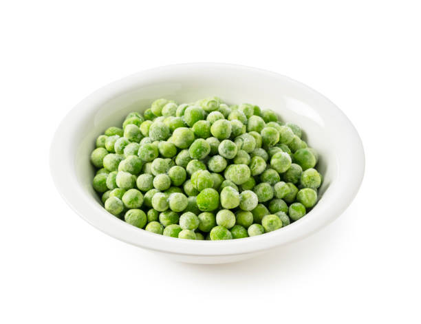 istock Frozen Green Peas in a Bowl on a White Background 2200966297