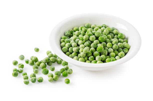 istock Frozen Green Peas in a Bowl on a White Background 2200966298