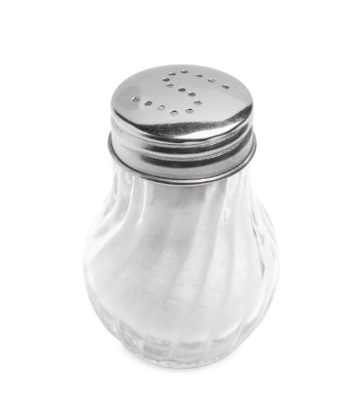 istock Natural salt in shaker on white background 2200968510