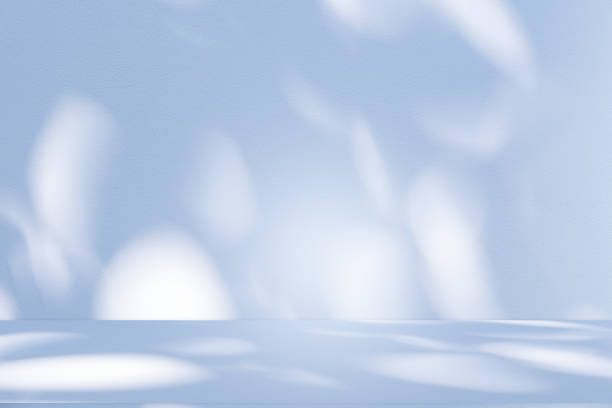 istock Studio style background wall decoration presentation uses white and blue tones. with shadows cast from a nearby window, concept creating a decorative 2200975896