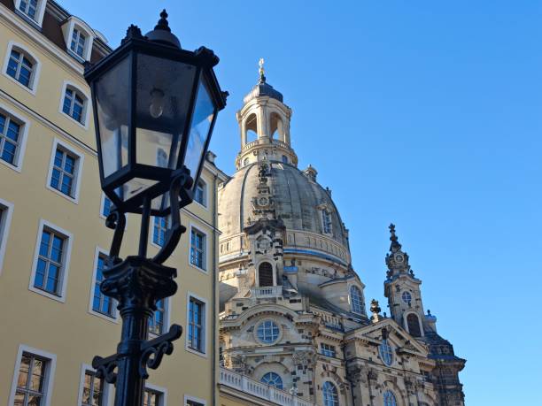 famous frauenkirche with blue sky and streetlamp