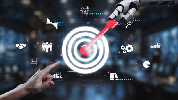 istock Digital Targeting Concept with Robotic Hand and Human Interaction in Futuristic Technology Office Environment. Auvana 2200981452