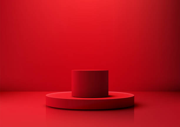 istock Red cylindrical 3d podium on circular base for product display and graphic design mockups 2200984559