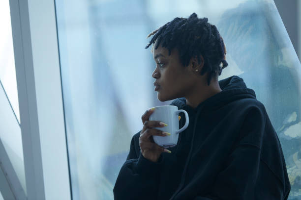istock African descent young lady enjoying morning coffee 2200987567