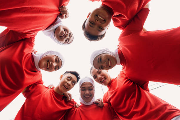 istock Diverse Women’s Football Team Huddle Before the Game 2200989088