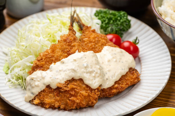 istock Arranged Japanese Fried Horse Mackerel and Cuisine on Dining Table 2200990942