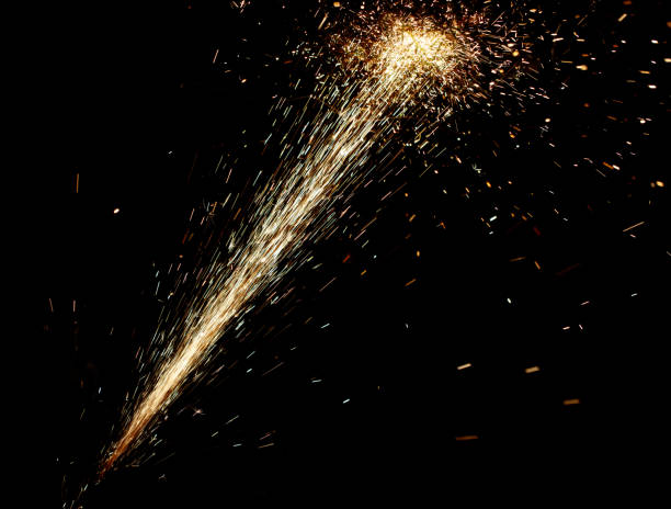 istock A bright, glowing firework trail is shot against a dark background 2200993415