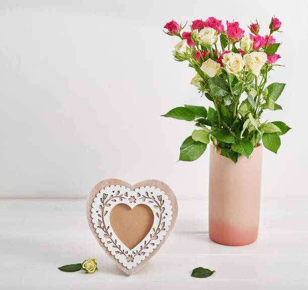 istock Mother's Day greeting card. Pink flowers on and cake. Easter spring  flovers 2201002655