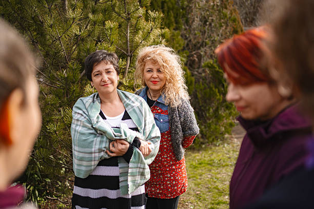 istock Women modelling a situation during group drama psychotherapy 2201003228