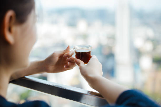 istock Asian young girl at home drinking enjoying in coffee. 2201003455