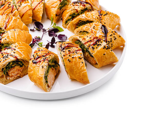 istock Savory pastry platter displaying delicious filled rolls with vibrant colors and textures for an inviting culinary experience 2201008367
