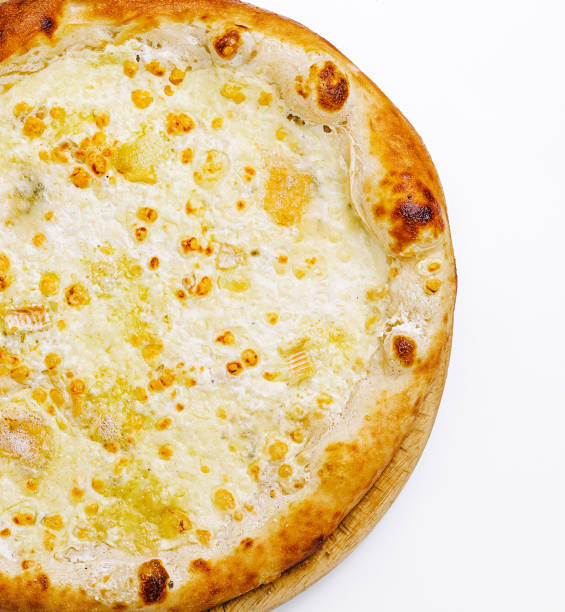 istock Delicious white pizza with a crispy crust and melted cheese sitting on a wooden serving board 2201008537