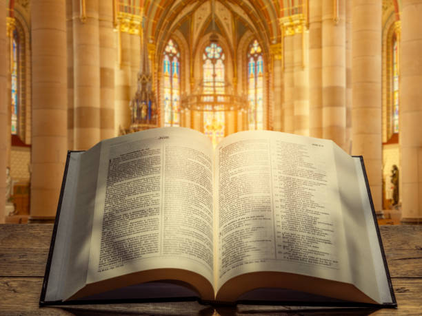 Bible close-up. Christianity concept. Reading the Holy Bible. High quality photo. Reading the Holy Bible, faith, worship, prayer. Bible in women's hands.