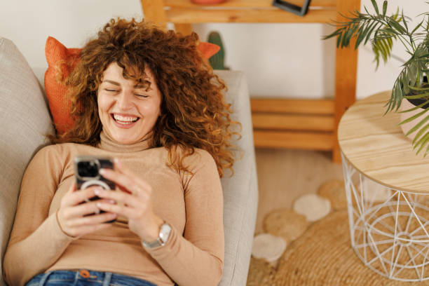 istock Watching funny videos at home 2201019778