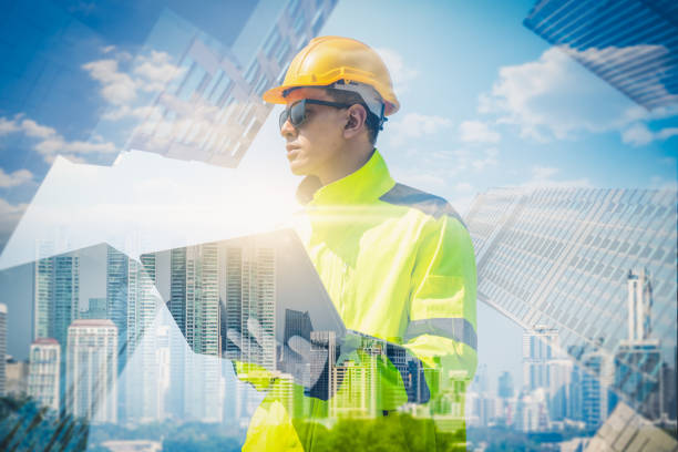 istock The double exposure image of the engineer thinking overlays with cityscape image with copy space. The concept of engineering, construction, futuristic and industry. 2201022703
