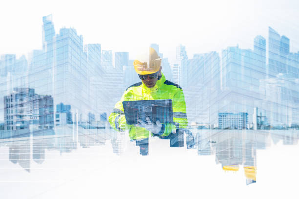 istock The double exposure image of the engineer thinking overlays with cityscape image with copy space. The concept of engineering, construction, futuristic and industry. 2201022728