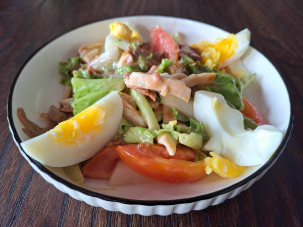 Serving Plate Of Chicken Salad With Chicken Meat, Boiled Eggs And Fresh Vegetables. Food Menu.
