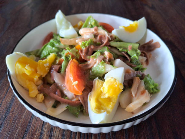 Yummy Chicken Salad With Chicken Meat, Boiled Eggs And Fresh Vegetables. Food Menu.