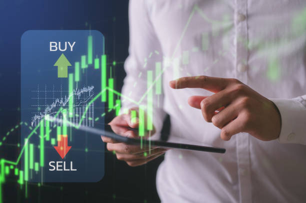 istock investment financial concept Business finance data analytics graph.Financial management technology.Advisor using KPI Dashboard on virtual screen, man using digital tablet working with data charts 2201027445