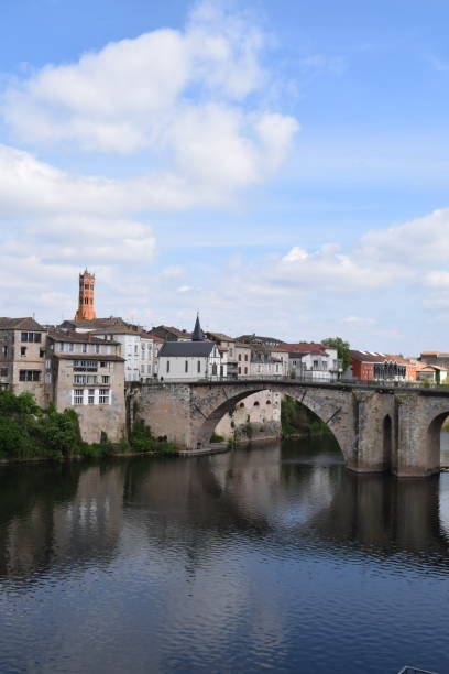 istock Old bridge over the river in France 2201027837