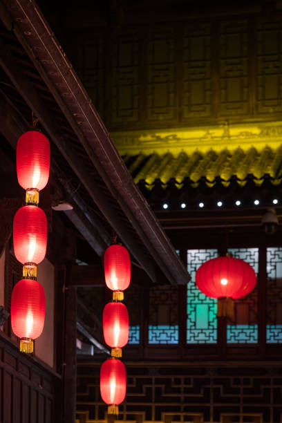 istock Traditional Chinese Lanterns in a Courtyard at Night 2201028710