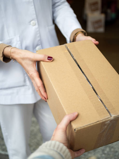 istock Pharmacist receives a package in a community pharmacy 2201040374