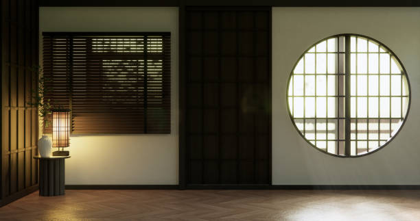 istock room and japan door Looking from the window light shining through outside. 2201042751