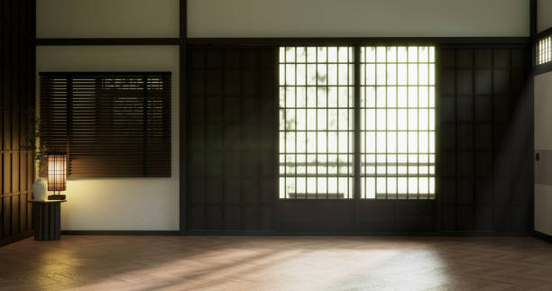 istock room and japan door Looking from the window light shining through outside. 2201042769