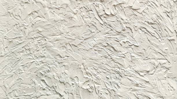 istock Minimalist white textured background with abstract brushstrokes, handmade. Decorative plaster, universal style for interiors, printing, graphic design 2201045144